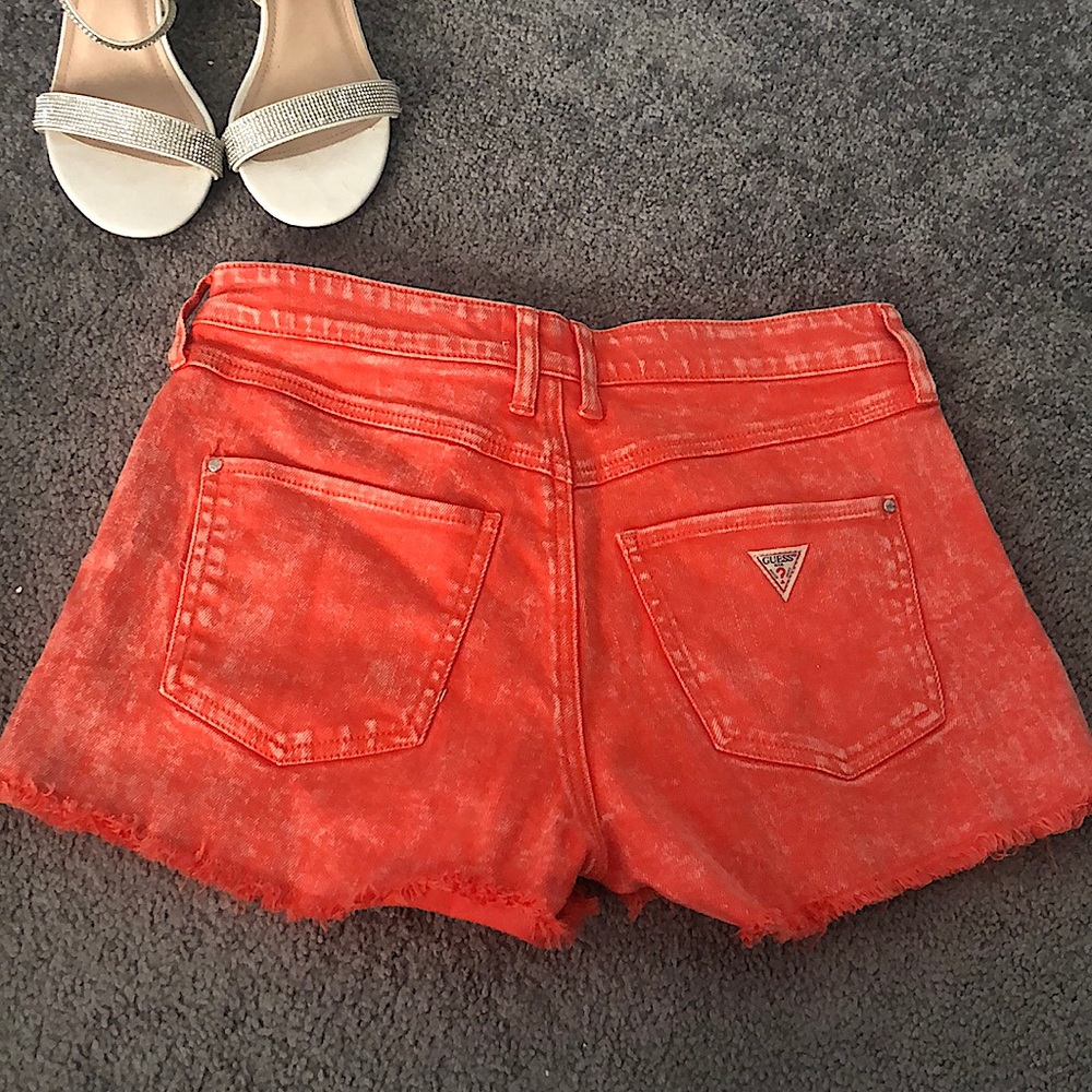 Orange acid wash jean shorts